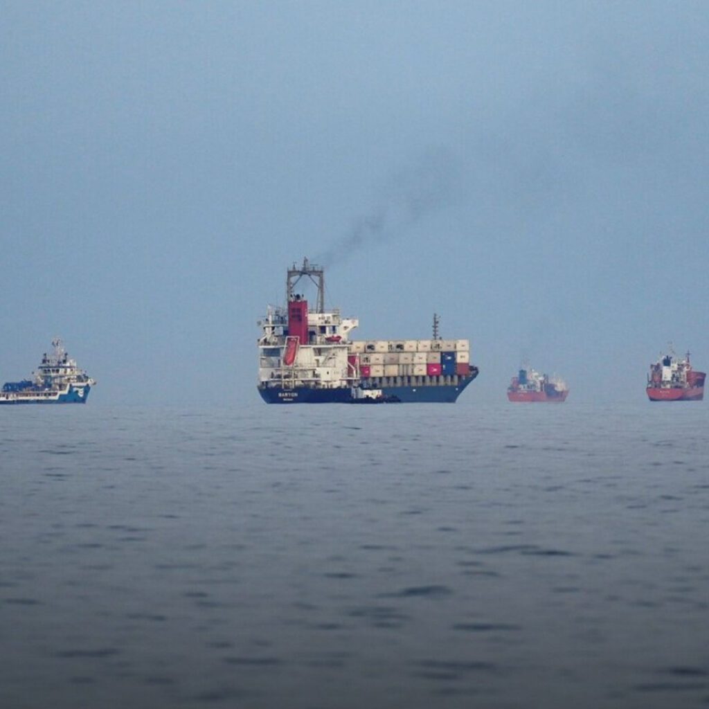 Oil tankers and cargo ships lined up in the Gulf of Oman, United Arab Emirates