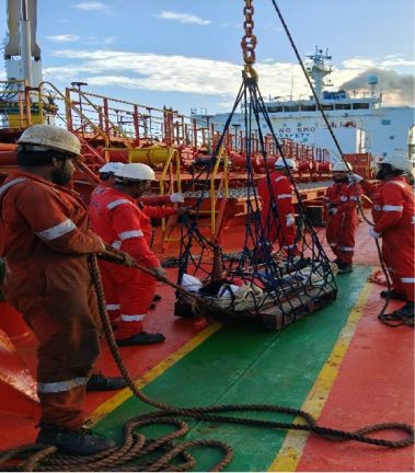 The injured fisherman is brought aboard GEMINI PEARL by stretcher basket after the vessel diverted to assist SUN CITY 16 in the Indian Ocean