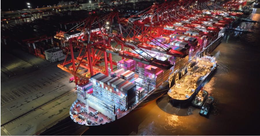 Dual-fuel container ship YM Willpower docked at Shanghai Port.